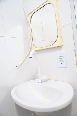 Shower, towels, soap, toilet paper