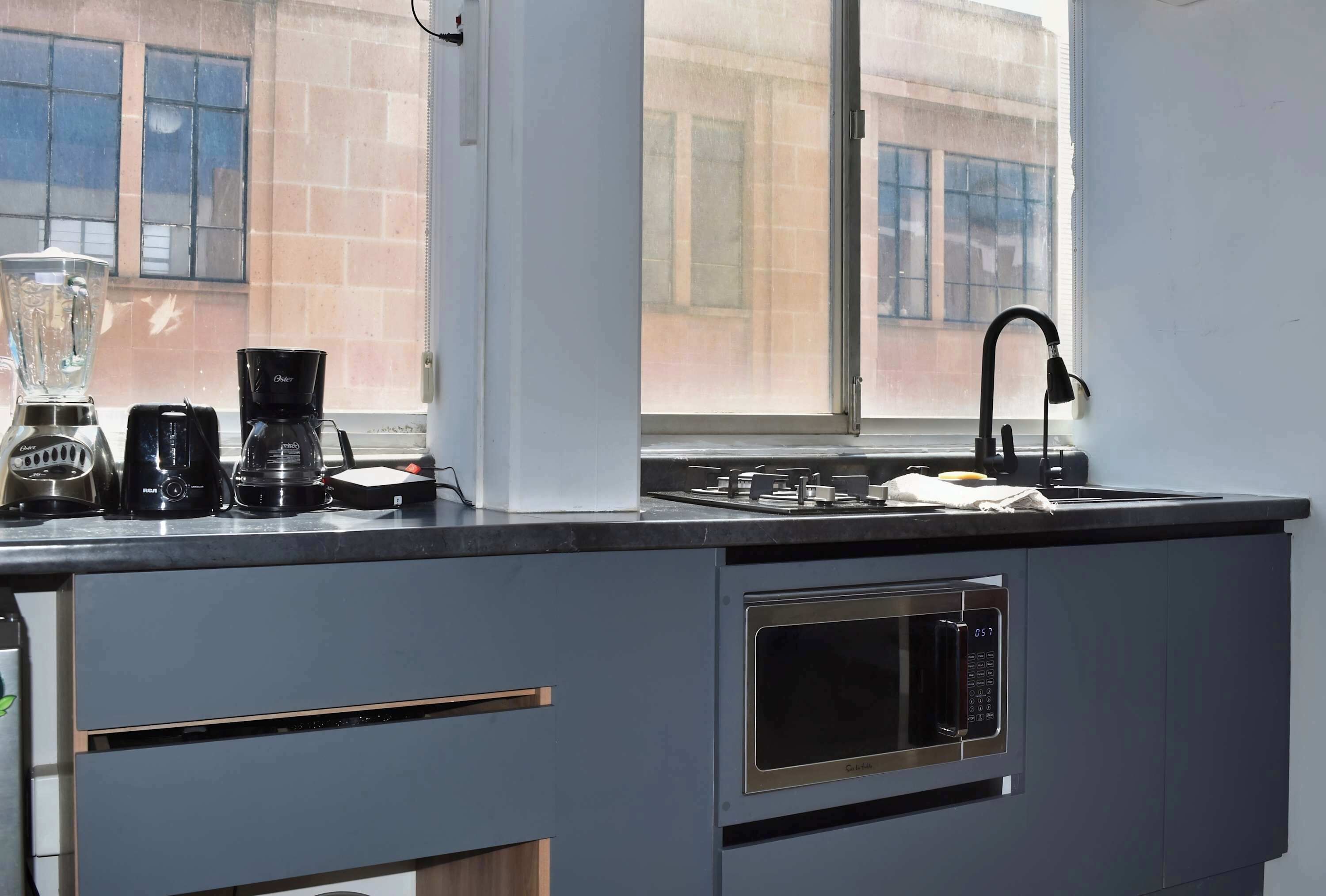 Microwave, coffee/tea maker, toaster, blender