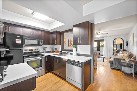 Fridge, microwave, oven, stovetop. Charming 2-bedroom dog-friendly condo walking distance to Downtown Clarksville.