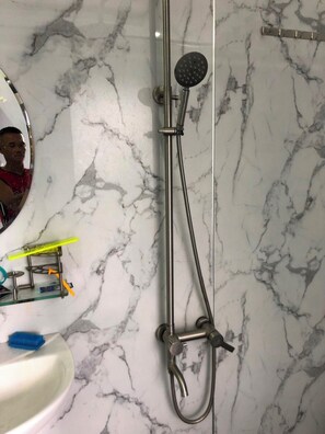 Shower, hair dryer, slippers, bidet