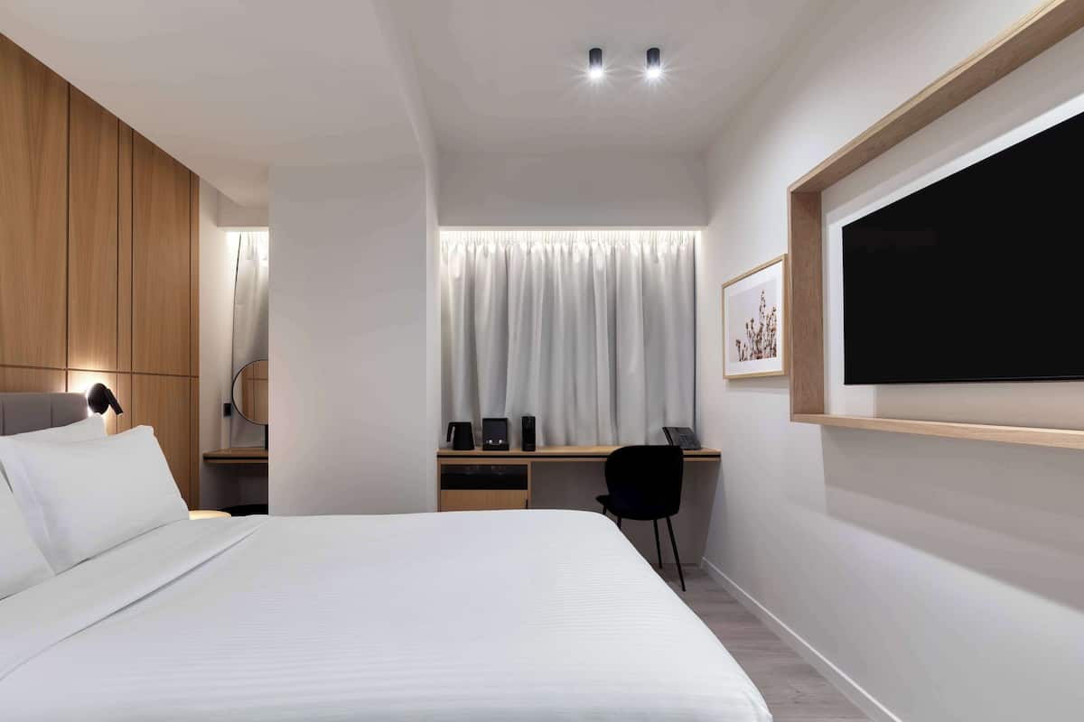 Chambre double | Système dâinsonorisation, accès au Wi-Fi (inclus), literie fournie