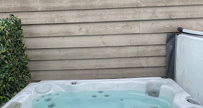 Cozy Carriage Home with Hot Tub. Pet-Friendly!