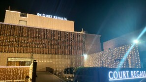 A building with a sign reading "COURT REGALIA" at the top. - COURT REGALIA UNIT OF S & G FESTIVITIES (Gulha)