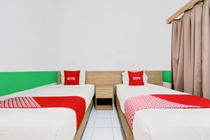 Chambre Deluxe avec lits jumeaux | Accès au Wi-Fi (inclus), literie fournie
