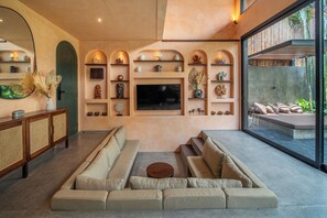 Deluxe Villa, Private Pool, Pool View | Living area | 32-inch Smart TV with digital channels - The Mystik Loft Harmony (Canggu)