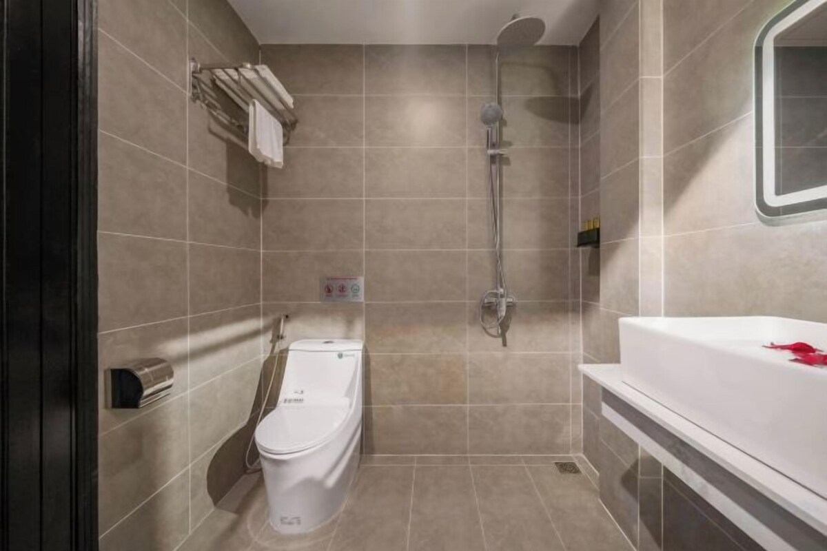 Hair dryer, slippers, towels, soap