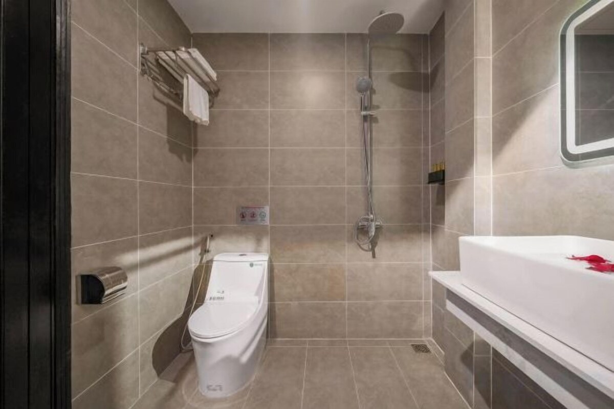 Hair dryer, slippers, towels, soap