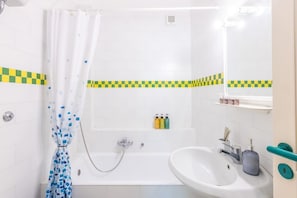 Eco-friendly toiletries, hair dryer, bidet, towels
