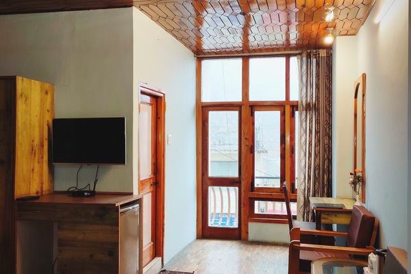 Deluxe Double Room, Balcony, River View | Desk, laptop workspace, WiFi (free), individually decorated
