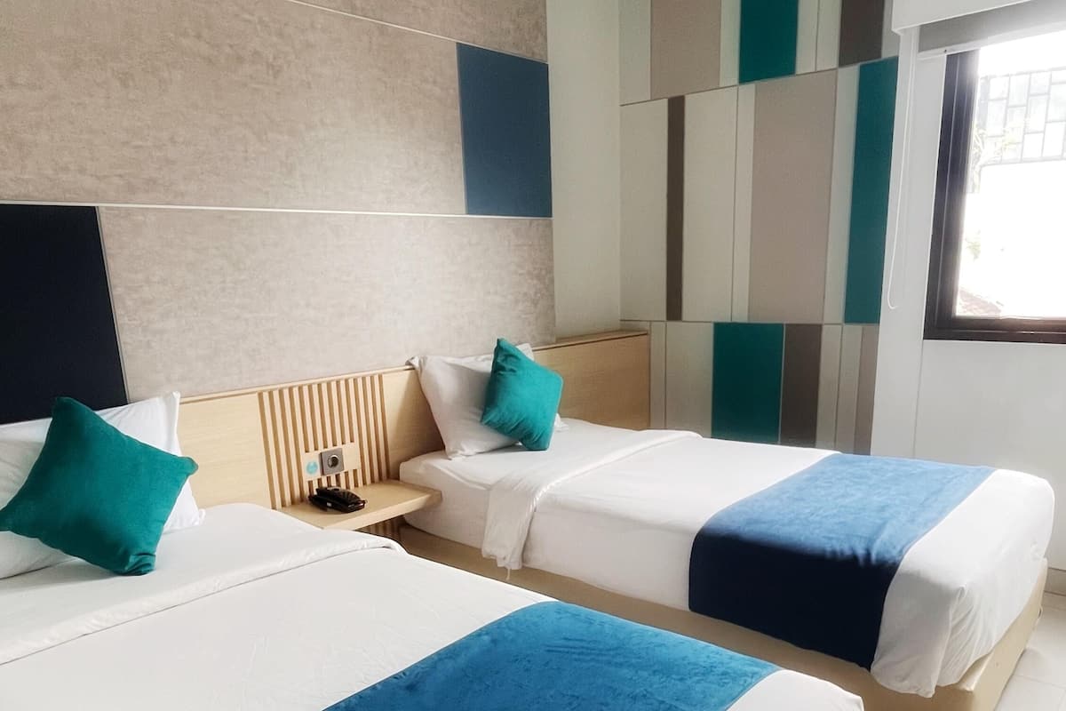Chambre Deluxe avec lits jumeaux | Bureau, Wi-Fi gratuit