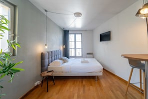 Apartment | Laptop workspace, iron/ironing board, bed sheets