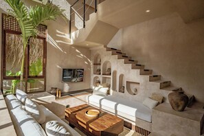 Junior Villa, Patio, Pool View | Living area | 55-inch flat-screen TV with cable channels - Villa Ubuntu at Bocoa Villas (Canggu)