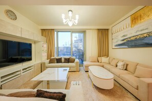 Deluxe Apartment, 2 Bedrooms, City View | Living area | Flat-screen TV - Forte Luxe - Stylish 2BR Downtown Escape (Dubai)