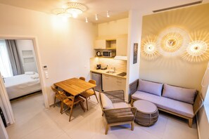 Superior Apartment, City View | Living area | Flat-screen TV - Onyro Villas (Karpathos)