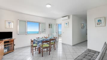 Standard Apartment, Multiple Bedrooms (Porto Relax Apartment 2 With Sea View) | Living area | 21-inch flat-screen TV with digital channels, TV