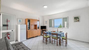 Family Apartment, 2 Bedrooms, Balcony (Porto Relax Apartment 2 With Sea View) | Living area | 21-inch flat-screen TV with digital channels, TV