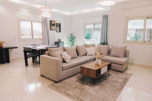 Living area - VIOLA Near Waterway - 11, VIOLA New Studio - Higher Floor (New Cairo City)