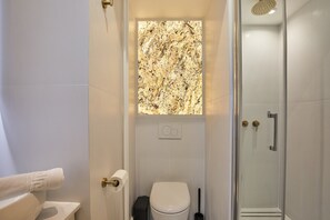 Apartamento | Banheiro | Secador de cabelo, shampoo