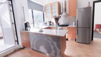Comfort Apartment, 1 King Bed, Patio | Living area | Flat-screen TV