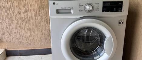 Shower, free toiletries, slippers, soap