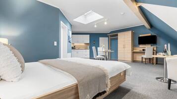 1 bedroom, desk, iron/ironing board, travel crib