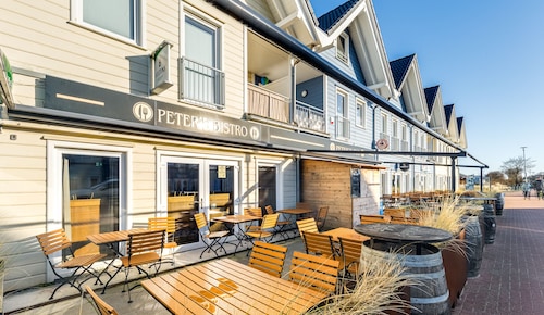 Bude 8 directly on the dike in Dagebüll for 2 persons with water view
