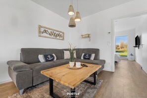 Téléviseur, foyer, table de ping-pong