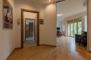 Apartment, Balcony | Living area | 35-inch TV with digital channels