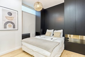 Apartment | Laptop workspace, iron/ironing board, bed sheets