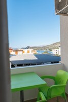 Comfort Triple Room, City View | Balcony