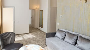 Luxury Apartment, Balcony, Mountain View | Living area | TV, printers