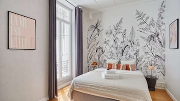 Apartment | Laptop workspace, iron/ironing board, bed sheets