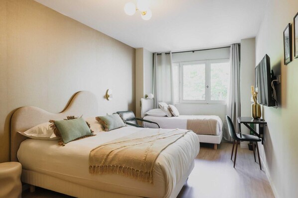 อพาร์ทเมนท์ | 1 ห้องนอน, พื้นที่ทำงานแบบใช้แล็ปท็อป, เตารีด/โต๊ะรีดผ้า, ผ้าปูที่นอน