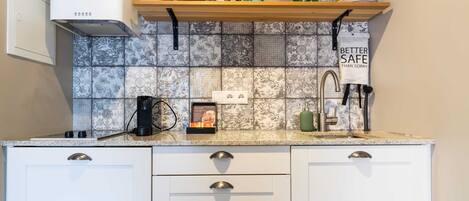 Fridge, stovetop, coffee/tea maker, toaster