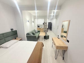 Premium bedding, Select Comfort beds, laptop workspace, blackout drapes