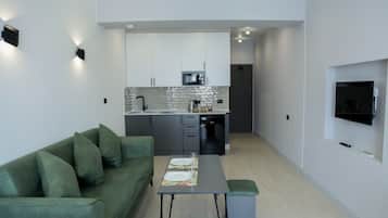 Studio – deluxe, kjøkken | Eget kjøkken | Kjøleskap, mikrobølgeovn, kokeplater og vannkoker