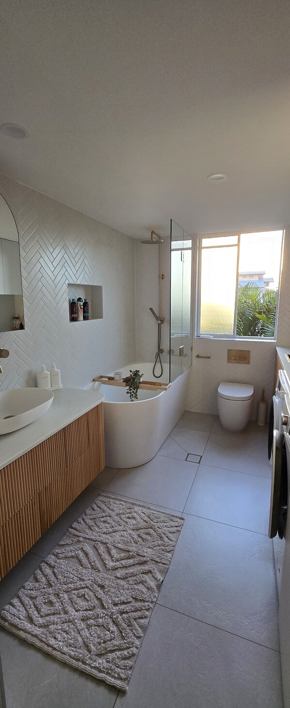 Shower, hair dryer, towels, soap