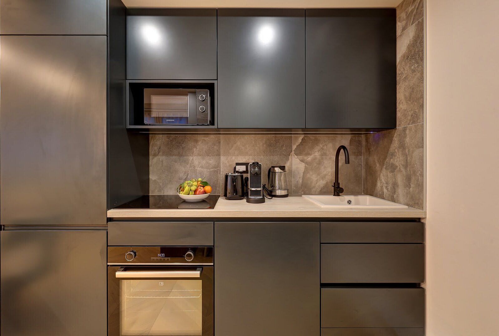 Fridge, microwave, stovetop, coffee/tea maker