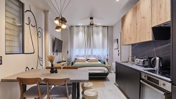 Apartamento | Cozinha privada | Geladeira, micro-ondas, fogão, cooktop