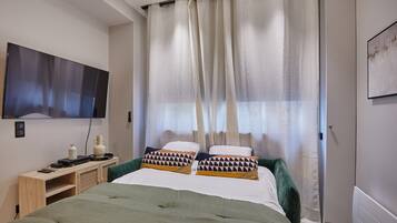 Apartamento | Espaço de trabalho para notebook, ferros/tábuas de passar roupa