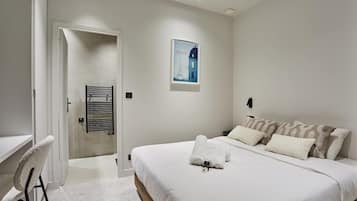 Apartment | Laptop workspace, iron/ironing board, bed sheets