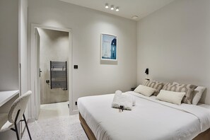 Apartment | Laptop workspace, iron/ironing board, bed sheets