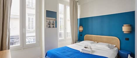 Apartment | Laptop workspace, iron/ironing board, bed sheets