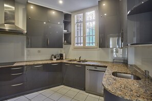 Apartment | Private kitchen | Fridge, microwave, oven, stovetop