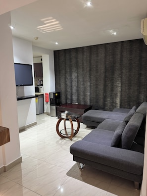 Executive Apartment | Living area | 41-inch flat-screen TV with cable channels, TV - Eagles Accra (Accra)