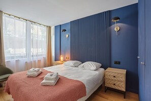Apartment | Laptop workspace, iron/ironing board, bed sheets