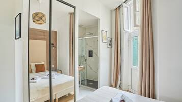 Apartment | Laptop workspace, iron/ironing board, bed sheets