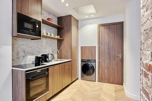 Apartment | Private kitchen | Cleaning supplies - Exceptional Apartment With AC - Heart of Paris (Paris)