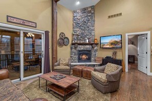 Smart TV, fireplace, foosball, books