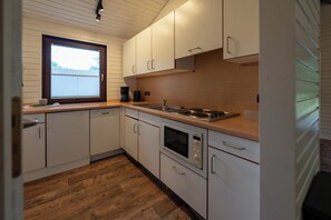 Fridge, microwave, dishwasher, coffee/tea maker